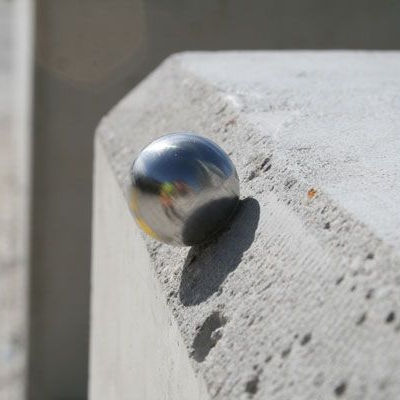 TacPro stainless steel skateboard deterrents (ball shape) installed to chamfered wall edge