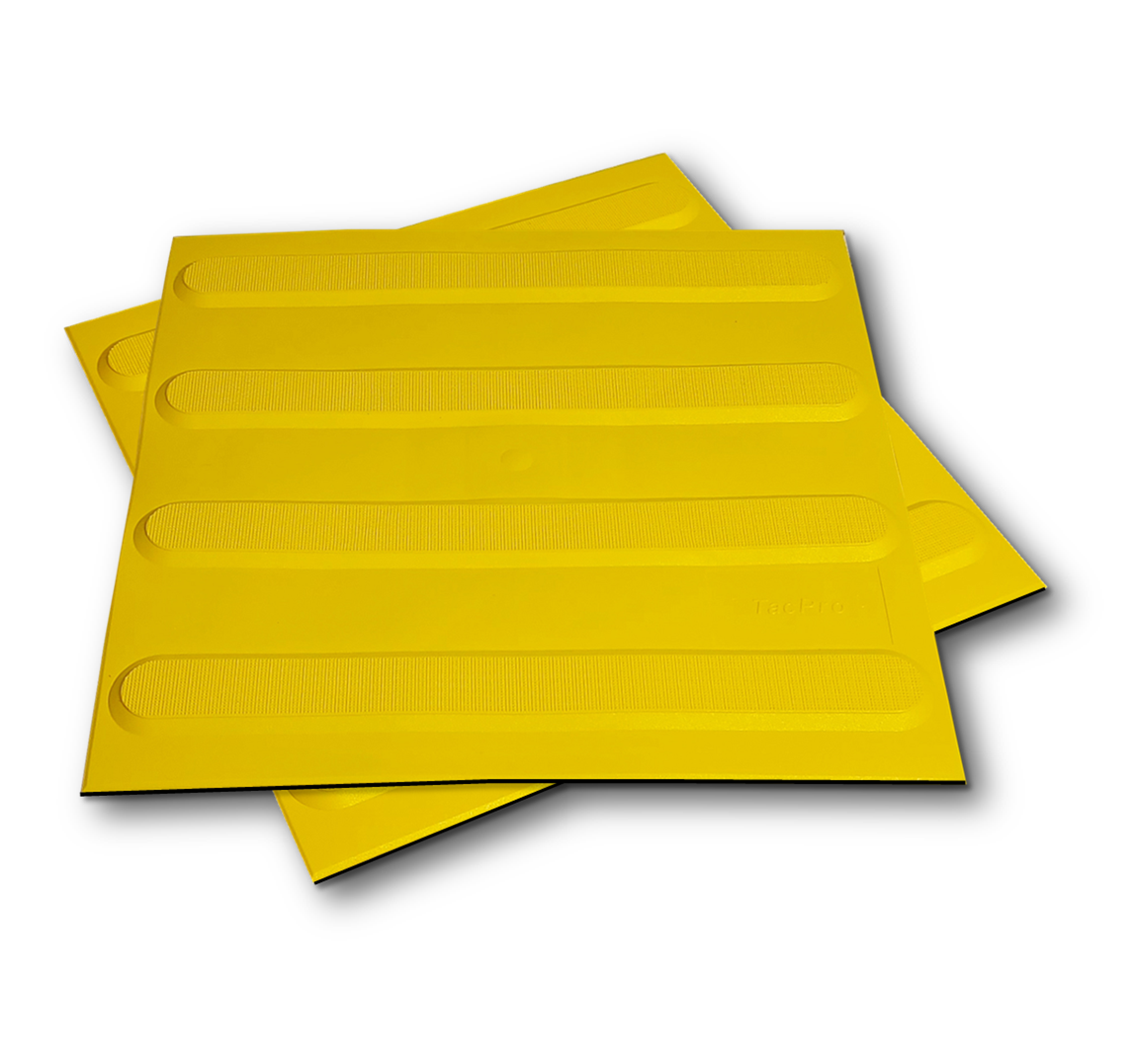 Two TacPro yellow peel-and-stick tactile directional indicator tiles. Main product photo