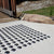 TacPro stainless steel tactile indicators with carborundum infill on concrete