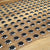 TacPro stainless steel tactile indicators with carborundum infill on timber