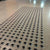 TacPro stainless steel tactile indicators with carborundum infill on light grey polished tiles