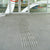 TacPro stainless steel tactile directional indicators installed to concrete leading to a school main entrance door