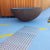 TacPro stainless steel tactile indicator warning plates on blue painted carpark